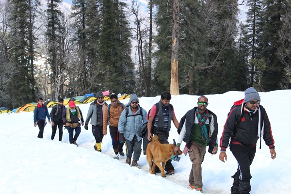 A group enjoying the scenic views from a mountain