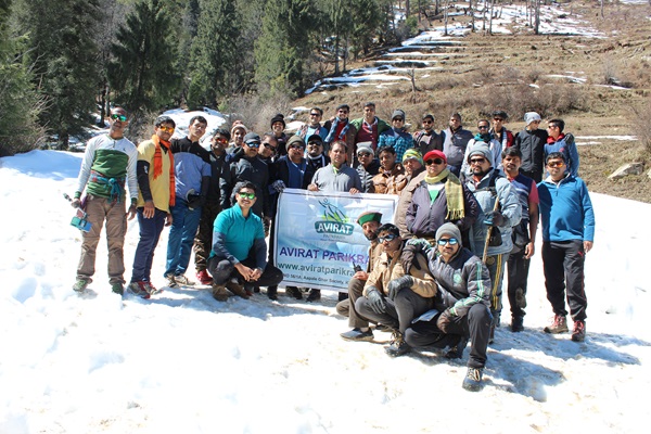 A group posing for a picture in the snow at Kufri