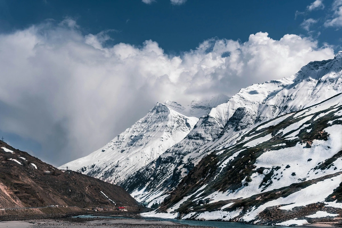 The lush green valleys and snow-capped peaks of Manali