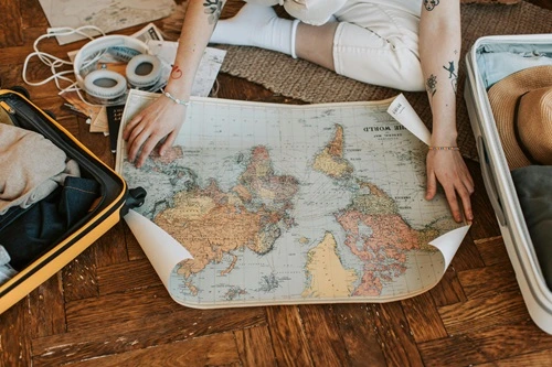 People planning a custom tour on a map