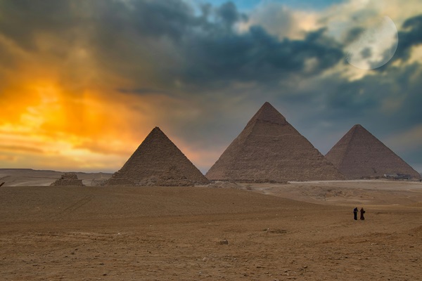 The Great Pyramids of Giza under a starry sky
