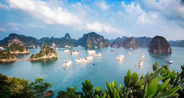 A cruise boat on the waters of Ha Long Bay, Vietnam